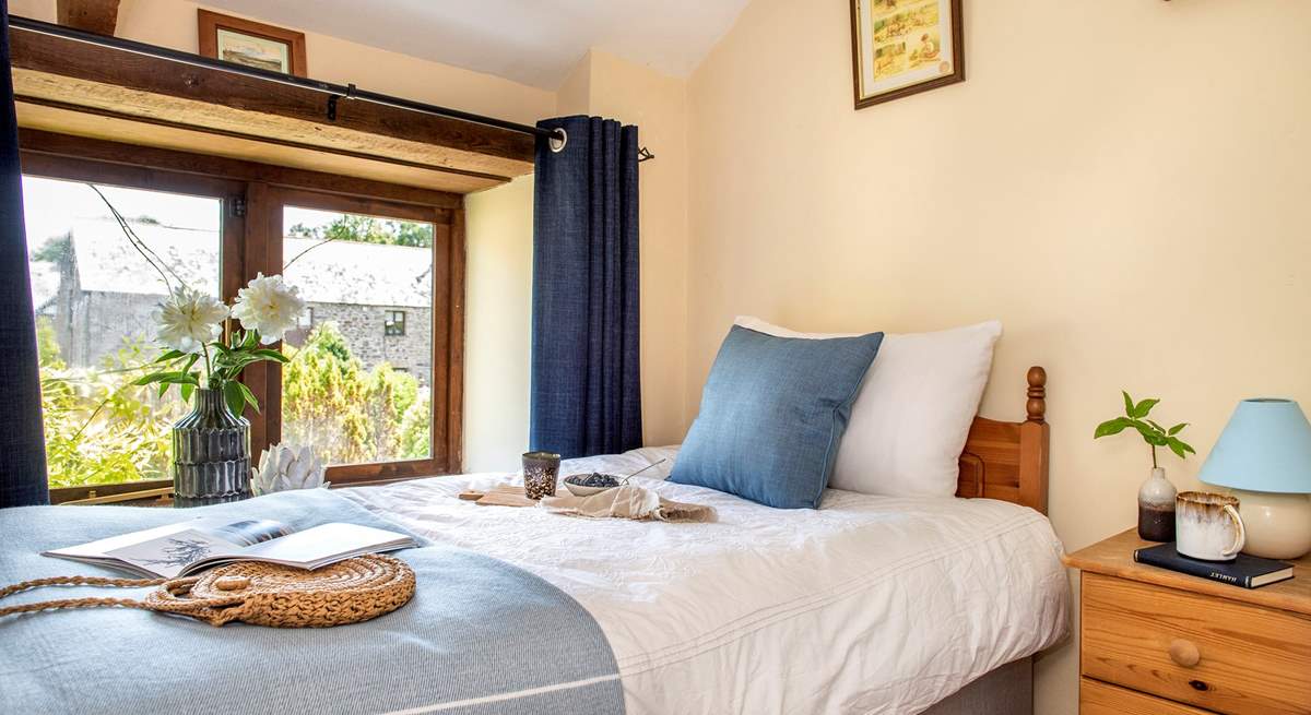 Bedroom three is kept light and airy by its wonderful window.