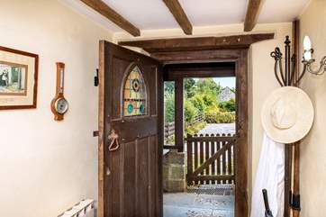 Enter through the beautiful period door.