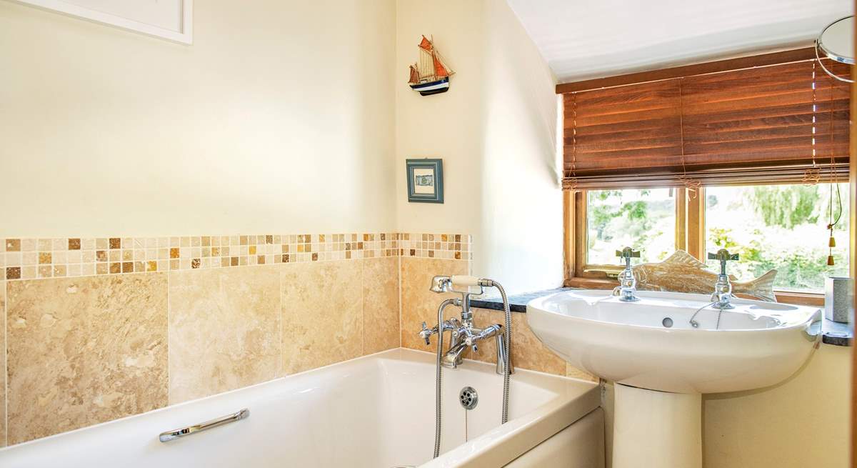 The family bathroom is the perfect place to relax after a day of exploring.