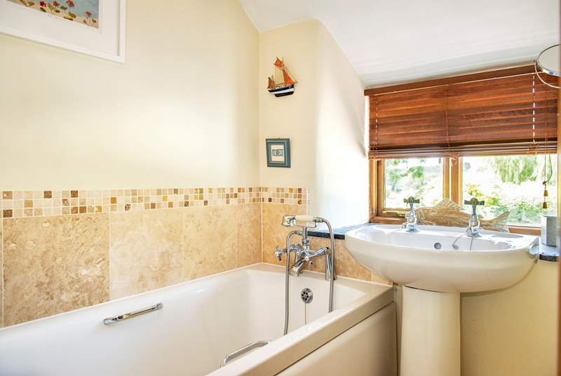 The family bathroom is the perfect place to relax after a day of exploring.