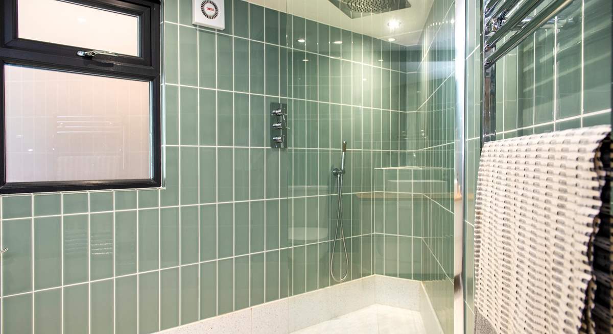 A beautifully finished shower-room makes up the ground floor.