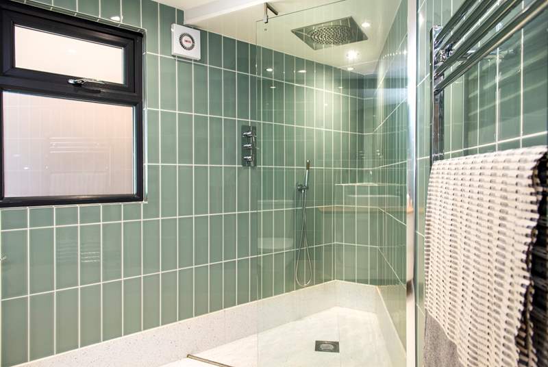 A beautifully finished shower-room makes up the ground floor.
