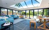 The stunning contemporary living space has an amazing apex roof window, perfect for star gazing.  - Thumbnail Image