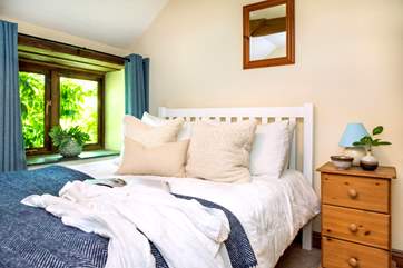 Snuggle up on bedroom two's double bed after a busy day.