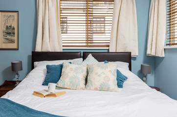 A fabulous 'zip and link' king-size bed sits in the centre of bedroom two.