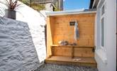 The surf and boot shack at the rear of Ocean View is a great place for storing essential holiday gear for your coastal escape. There's also an outside shower so you can rinse yourself or the dog after time on the beach. - Thumbnail Image