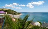 The beach in the village is just down the hill , you have a bird's eye view from the decking. - Thumbnail Image