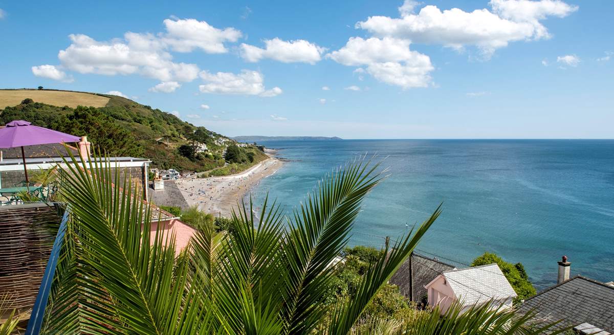 The beach in the village is just down the hill , you have a bird's eye view from the decking.