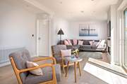 The light really floods into the open plan living-room.