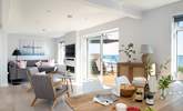 The open plan living-room really makes the most of the view. - Thumbnail Image