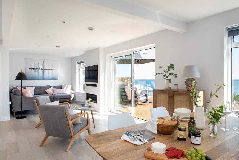 The open plan living-room really makes the most of the view.