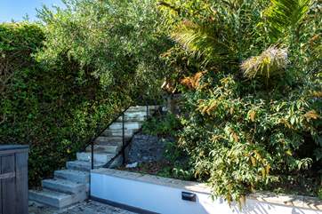 From the lower parking area there are 50 steps up through the tropical gardens to Ocean View.