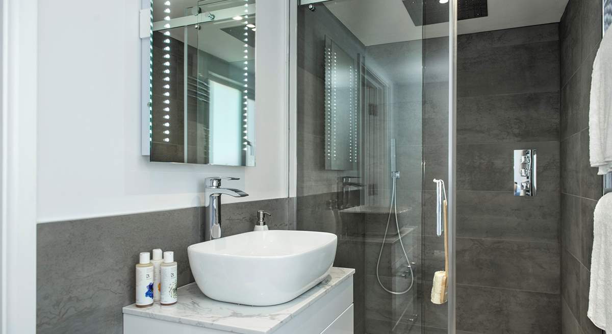 The second bedroom has an en suite shower-room. The super drench head shower will certainly set you up for the day.