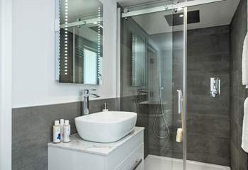 The second bedroom has an en suite shower-room. The super drench head shower will certainly set you up for the day.