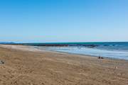 The beach at Seaton, when the tide is out you can walk all the way along the headland to Rame Head.