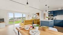 The open plan space is ideal for sociable evenings with the addition of a wood-burner for those chillier evenings!