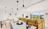 The stylish open plan living space has wonderful views of the River Dart. - Thumbnail Image