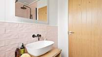 With pretty pink tiles.