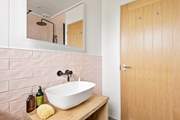 With pretty pink tiles.