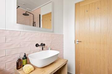 With pretty pink tiles.