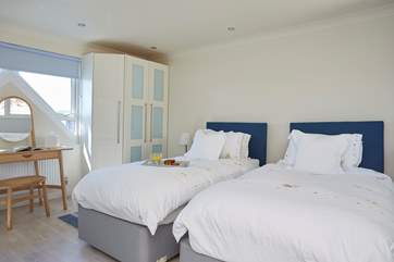 Bedroom 3 is on the second floor, with a 'zip and link' bed so you can choose between a super-king size double or twins. This room also has the added benefit of an en suite shower-room.