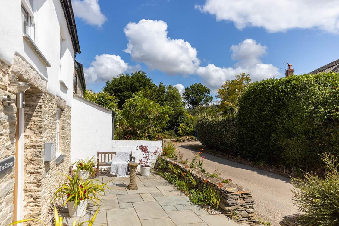 The Cottage looks out over a quiet country lane and catches the morning sun.