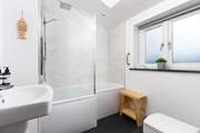 The family bathroom is on the ground floor and has a bath with rainfall shower over so you can choose between a refreshing shower or a long soak.