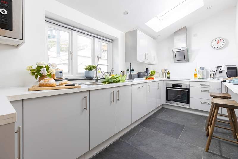 Light floods into the gorgeous kitchen from the Velux windows. There are two steps into the kitchen.
