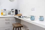 Perch on a breakfast stool and chat with the chef.