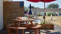 The Salterns are a small collection of holiday abodes which overlook a central communal area.
