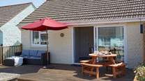 The patio doors lead out onto your own decked area.