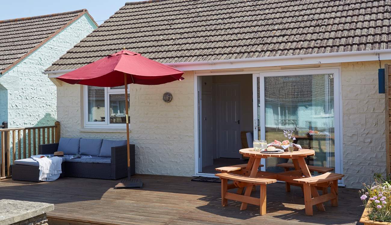 The patio doors lead out onto your own decked area.