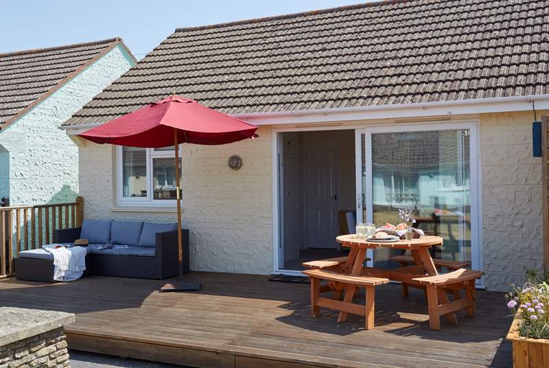The patio doors lead out onto your own decked area.
