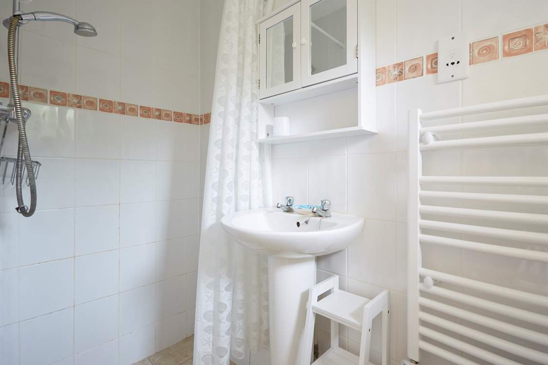 The shower-room for a refreshing shower after a busy beach day.