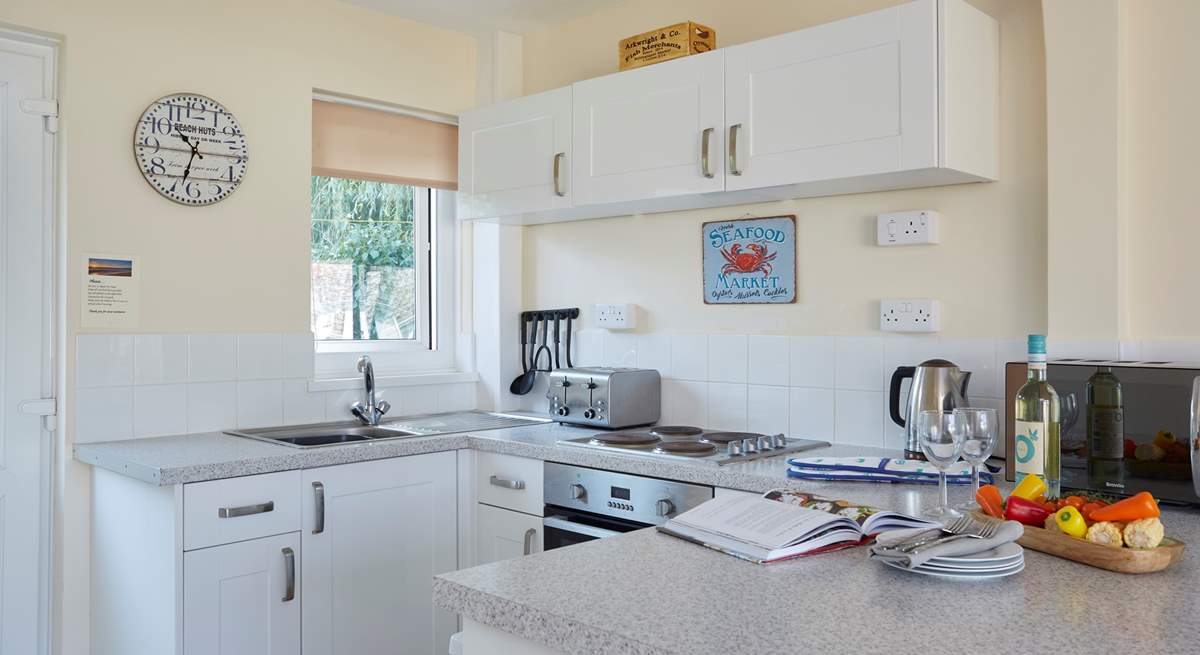 The compact kitchen area has all you need to cook a holiday meal.