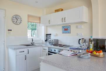 The compact kitchen area has all you need to cook a holiday meal.