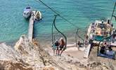 Take the chairlift to the beach and view the iconic Needles. - Thumbnail Image