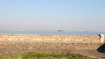 Located just a stone's throw away from the beach.