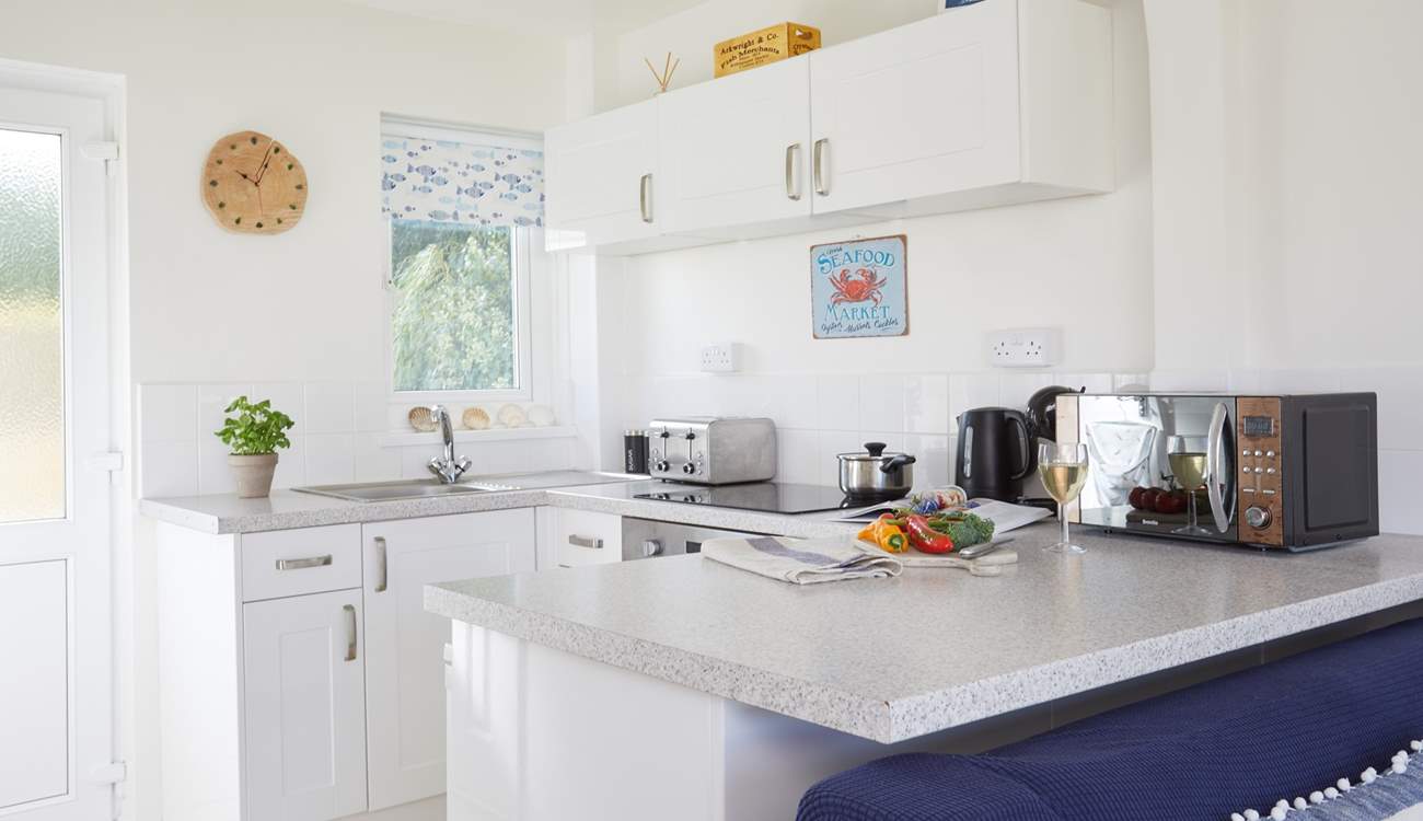 The compact kitchen area has all you need to cook a holiday meal.
