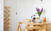 Enjoy breakfast around the foldaway table. - Thumbnail Image