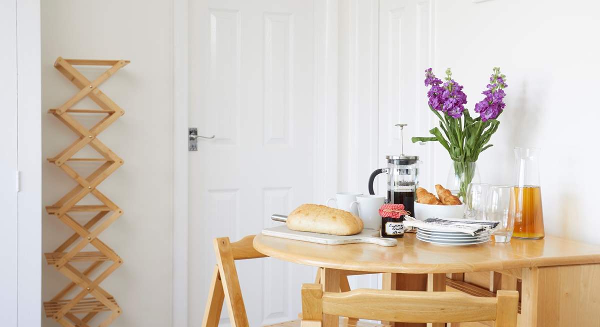 Enjoy breakfast around the foldaway table.