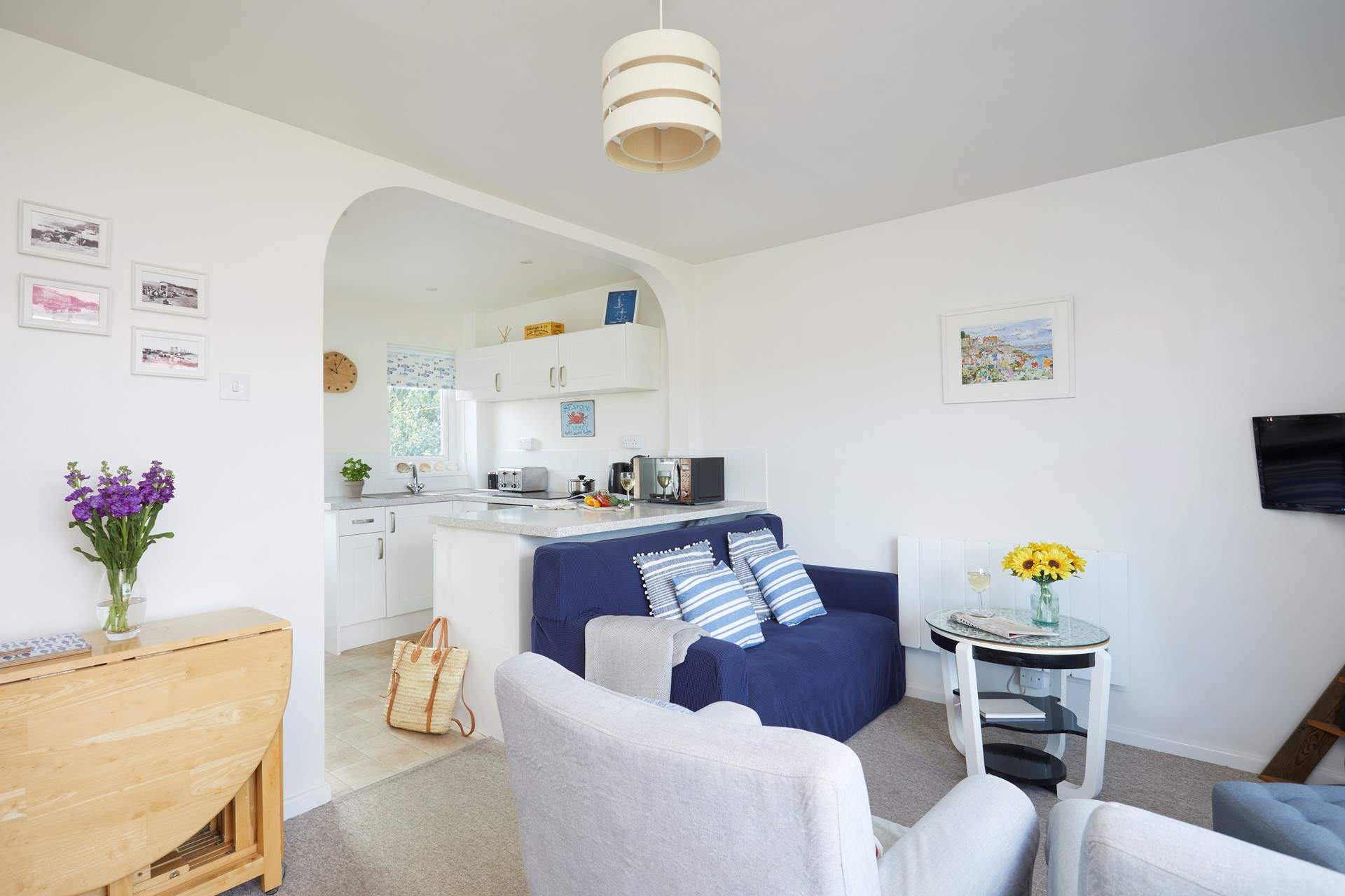 Welcoming interiors in seaside shades. 