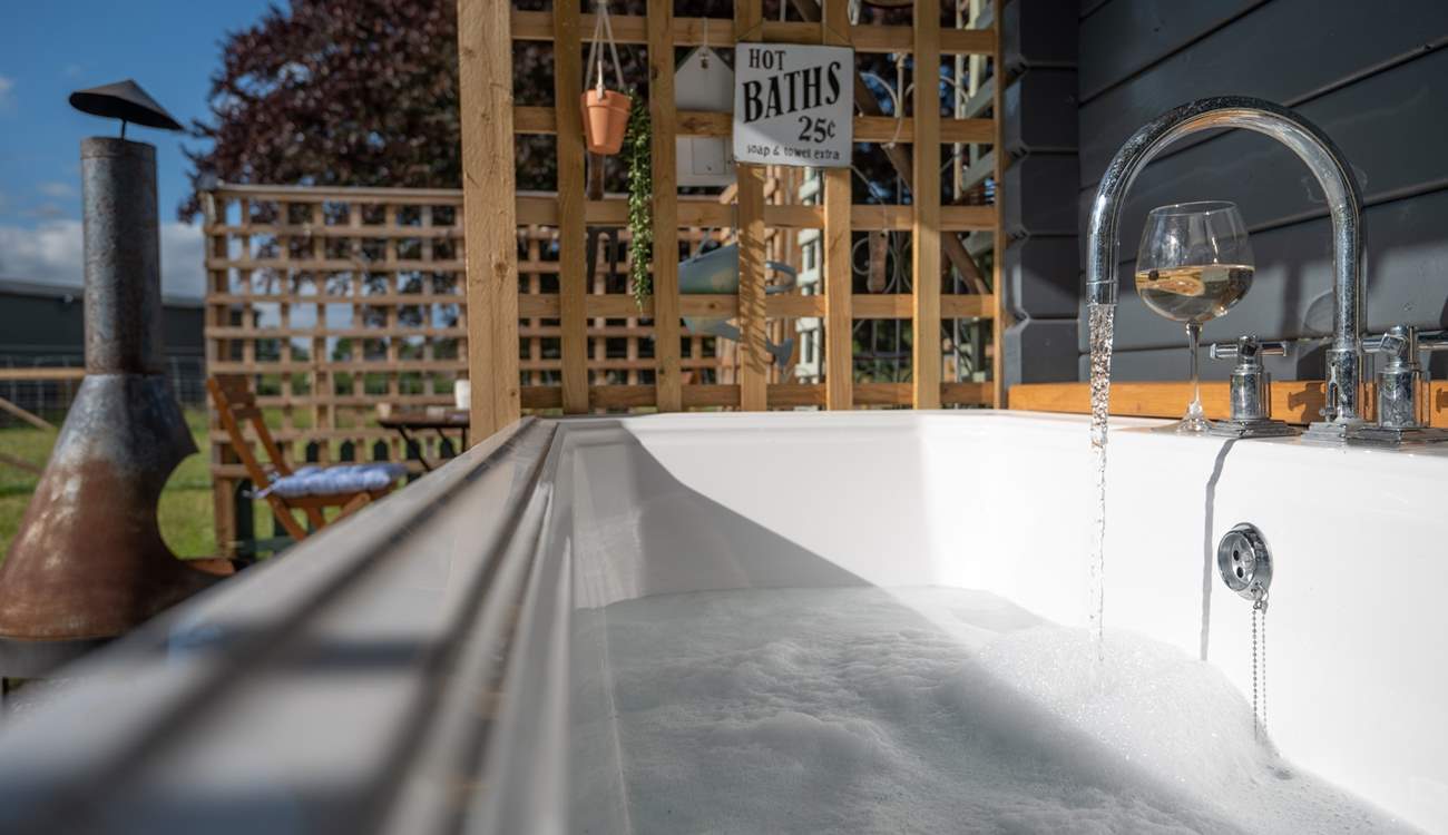 Soak in the bubbles with a glass of your favourite!