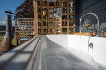 Soak in the bubbles with a glass of your favourite!