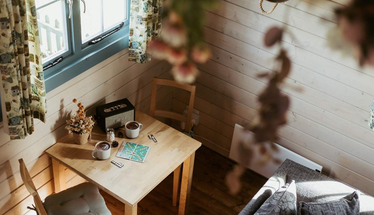 Take a seat at the sweet dining table for two. 