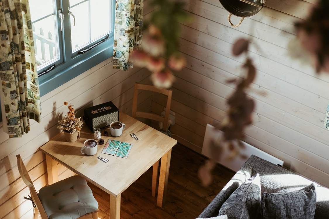 Take a seat at the sweet dining table for two.