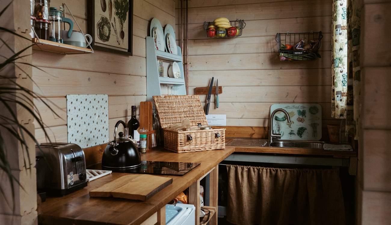 Rustle up a delicious meal in the quaint kitchen.