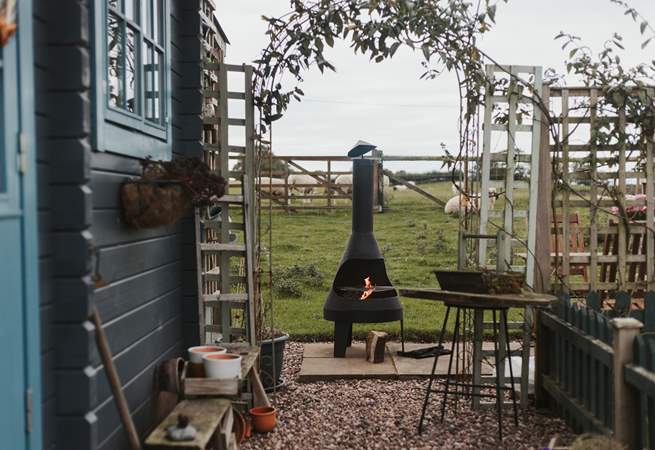 Light the chiminea-style barbecue and cook up a feast! 