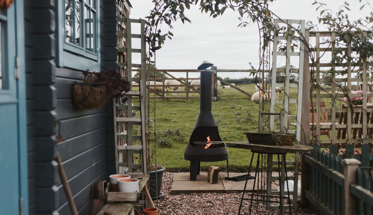 Light the chiminea-style barbecue and cook up a feast! 