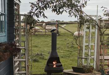 Light the chiminea-style barbecue and cook up a feast! 